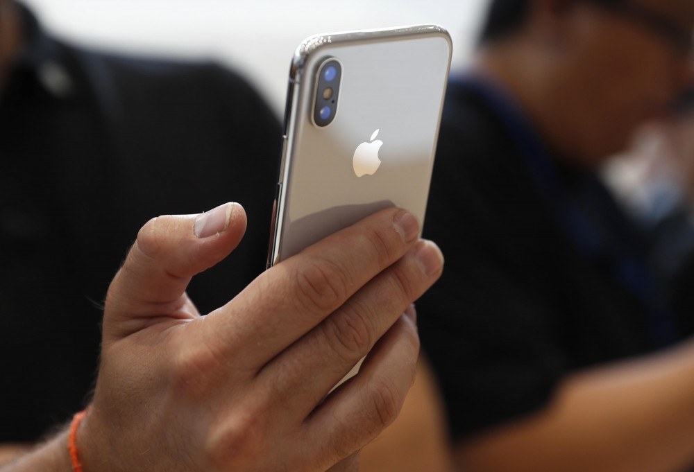 Attendee Checks Out New Iphone X During An Apple Launch Event In Cupertino